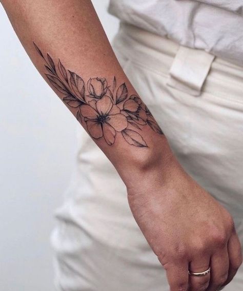 Side Wrist Floral Tattoo, Wrap Around Forearm Tattoo Women Simple, Tattoo Inner Forearm Woman, Floral Dog Tattoo Design, Wrist Floral Tattoos For Women, Wildflower Cover Up Tattoo, Inner Wrist Flower Tattoo, Outer Forearm Tattoo Women Simple, Wrist Flower Tattoos For Women