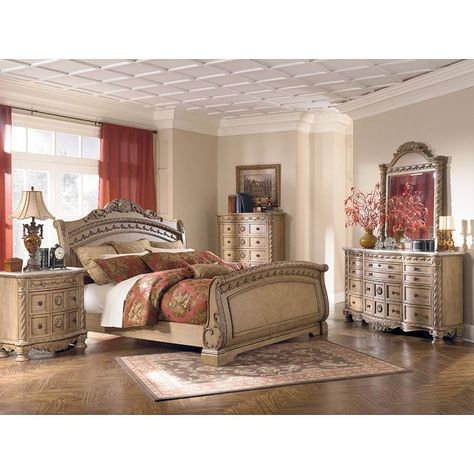 South Coast Sleigh Bedroom Set Millennium  in Bedroom Sets. The rich look of beautifully elegant furniture has never come to life more than with the traditional design of the South Coast Bedroom Collection. Alive with detail, this furniture is adorned with ornate hand applied decorations covered with the beautiful glazed bisque color. With diamond inlay stone veneer tops on dresser and night stand and dark bronze color metal hardware, the South Coast bedroom collection captures the true elegance North Shore Bedroom Set, Bedroom Sets Furniture, Ashley Bedroom Furniture Sets, Ashley Furniture Bedroom, Ashley Bedroom, King Size Bedroom Sets, Sleigh Bedroom Set, King Sized Bedroom, King Bedroom Sets