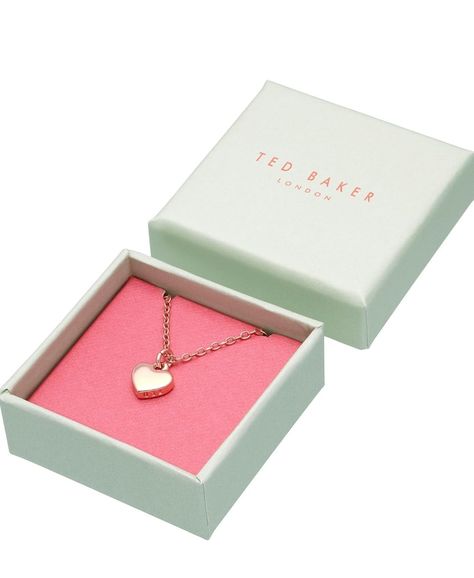 necklace and charm are both finished in rose gold tone plating and packaged in a small gift box PERSONALISE THE FIT: With an adjustable necklace extender, it's easy to adjust the length to sit between other rose gold necklaces in your collection MATCHING SET: The Sweetheart Ted Baker jewellery collection offers a matching bracelet and earrings alongside necklaces for women who love to layer up A GLORIOUS GIFT: This heart necklace is symbol of love, making it a thoughtful gift for women Ted Baker Jewellery, Necklace For Women Gold, Tiny Heart Necklace, Crystal Heart Earrings, Enamel Stud Earrings, Crystal Heart Necklace, Crystal Heart Pendant, Necklace Extender, Silver Heart Pendant