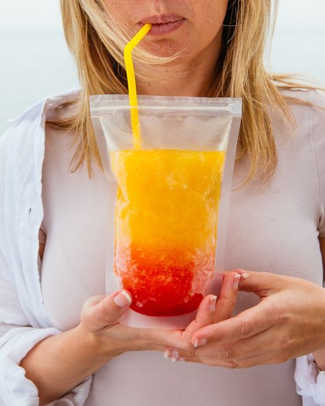 Vodka Slushie Sunrise in a Drink Pouch Frozen Adult Drink Pouch Recipes, Vodka Slush Recipe Frozen, Epcot France Orange Slush Recipe, Adult Capri Sun, Adult Drink Pouches, Vodka Sunrise, Drink Pouches, Capri Sun, Slushies