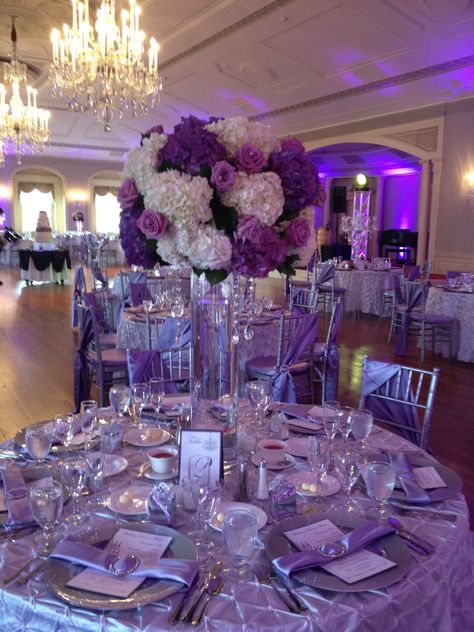 http://momentsintime.biz/    http://www.facebook.com/?ref=home#!/pages/Jen-House-A-Moment-In-Time-Wedding-Event-Production/161306051159 Light Purple Quince Centerpiece, Purple Quince Decorations, Sweet 16 Venues, Rapunzel Wedding Theme, Quince Decorations Ideas, Silver Wedding Decor, Purple Quinceanera Theme, Royal Purple Wedding, Lavender Quinceanera Dresses