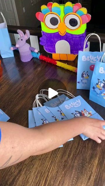 Bluey FanClub 💙💙 on Instagram: "Packing Bluey gift bags for my daughters birthday party! 🎥 Content by: on tiktok @justjocelynnaround#bluey #blueyabc #blueyandbingo #blueyaustralia #blueyofficial #blueyfans #blueytheheeler #blueymoments #blueytoys #blueyparty #blueycake #blueycostume #blueyfanart #blueysisters #blueyfamily #blueyfandom #blueylove #blueyfun #blueymom #blueydad #blueyparents #blueyfriends #blueyseason3 #blueymerchandise #blueysquad #blueyandfriends #blueyandfamily #blueyquotes #blueyparenting #blueymemes" Bluey Loot Bags, Bluey Goodie Bags Favors, Bluey Favor Bags, Bluey Gift Bags, Bluey Party Bags, Bluey Party Ideas, Bluey Party Favors, Bluey Birthday Party Ideas, Diy Party Bags