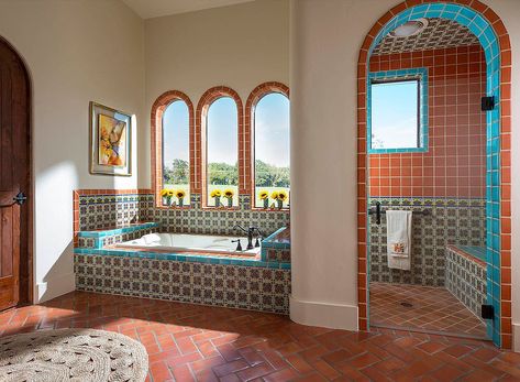 Terracotta tiles bring warmth, color and classic appeal to the bathroom [From: Astleford Interiors] Southwestern Bathroom, Spanish Style Bathrooms, Spanish Bathroom, Primary Bathroom, Mexican Home, Mediterranean Home Decor, Spanish Style Homes, Mediterranean Home, Spanish House