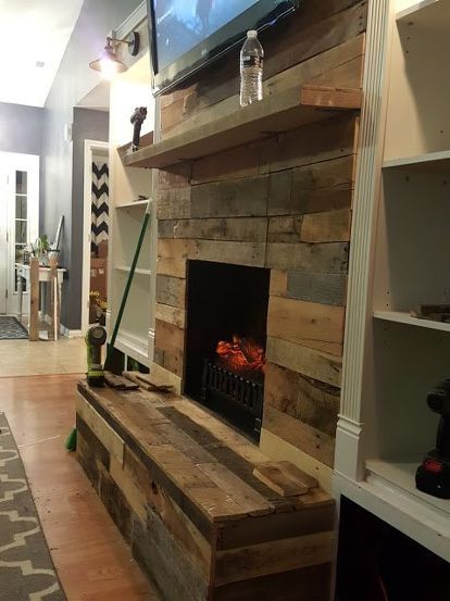 DIY Pallet Wood Fireplace - We were given a really awesome opportunity by Nautica at Home Interior Paint to makeover our living room color and style, so we deci... Pallet Wood Fireplace, Pallet Fireplace, Gorgeous Fireplaces, Wood Pallet Wall, White Fireplace, Rustic Fireplaces, Paris Grey, Faux Fireplace, Fireplace Remodel