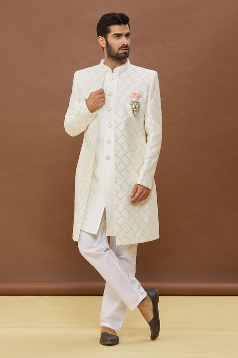 Off white front open jacket with sequin work and patch pocket. Paired with pant and sleeveless sherwani. Components: 3 Pattern: Embroidered Type Of Work: Sequin Neckline: Mandarin Sleeve Type: Full Fabric: Sherwani: Silk, Pant: PV Cotton Color: Off White Other Details:  Note: Brooch and pocket square worn by the model is not for sale The fabric is silk blend and not pure silk Occasion: Wedding - Aza Fashions Cream Sherwani, White Sherwani, Indian Wedding Clothes For Men, Seema Gujral, Kurta Cotton, Silk Pant, Western Suits, Open Jacket, Work Jacket