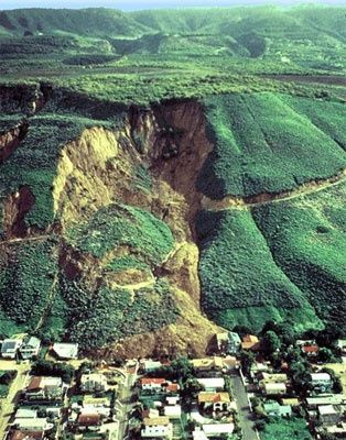 Natural causes of landslides include: groundwater (pore water) pressure acting to destabilize the slope, loss or absence of vertical vegetative structure, soil nutrients, and soil structure, erosion of the toe of a slope by rivers or ocean waves weakening of a slope through saturation by snow melt, glaciers melting, or heavy rains earthquakes adding loads to barely stable slope, earthquake-caused liquefaction destabilizing slopes, and volcanic eruptions. Geology Rocks, Earth Surface, Earth From Space, Natural Phenomena, Earth Science, Natural Disasters, Amazing Nature, Mother Earth, Nature Beauty