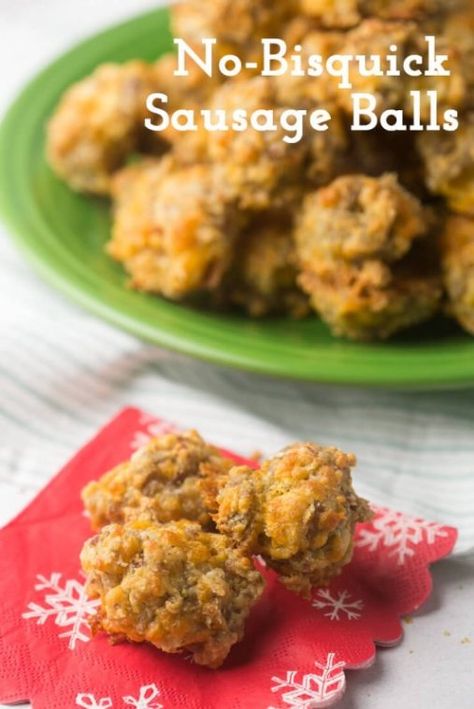 These easy sausage balls from scratch are a classic party favorite without the need for boxed mixes! Everyone at your holiday party or potluck will love them, and they are also perfect for a Christmas breakfast treat! Your family won't be able to get enough. Sausage, cheddar cheese, flour, baking soda, baking powder, salt, butter, and a little milk...so easy and delicious! | recipe from Chattavore.com #easyrecipe #easyappetizer #Christmasrecipe #sausageballs #sausageballrecipe #Christmasbreak... Best Sausage Ball Recipe, Easy Sausage Balls, Easy Sausage Balls Recipes, Sausage Balls Bisquick, Sausage Cheese Balls, Cream Cheese Sausage Balls, Sausage Balls Recipe, Sausage Balls, Jimmy Dean