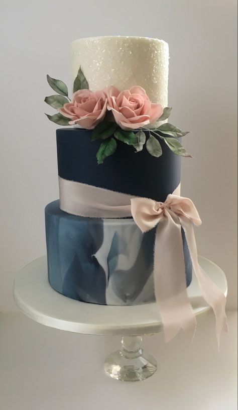 Beautiful navy blue & ivory wedding cake with handmade sugar roses & pure silk ribblon Navy Blue And Pink Wedding Cake, Navy And Blush Wedding Cake, Blue Themed Wedding Cake, Navy Blue Themed Wedding, Pale Pink Wedding Cake, Navy Wedding Cake, Royal Blue Wedding Cakes, Blush Pink Wedding Cake, Navy Blue Wedding Cakes