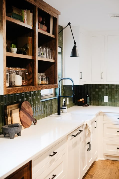 This modern farmhouse kitchen at our Summer Lane project was transformed by this high-gloss green subway tile. The vibrant hues, organic elements, and bespoke furnishings seamlessly blend indoor and outdoor spaces, crafting a haven for creativity, relaxation, and authentic living. Green Subway Tile Kitchen, Green Tile Kitchen, Kitchen Shaker Cabinets, Green Kitchen Backsplash, Green Tile Backsplash, Southwest Kitchen, Organic Modern Kitchen, Green Subway Tile, Eclectic Tile