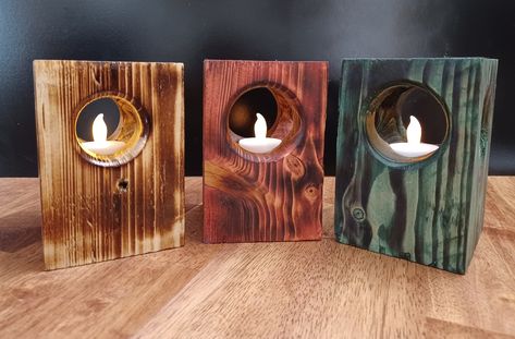 Pine block tea candle holders,  3 colors to choose from: natural with gloss coating, "fireside cherry" or "emerald green"  Protective foam pad base prevents scratching furniture. ALL candle holders are 5-1/2 inches tall and approx 3-1/2 square. Pictured with LED "candle"-INCLUDED. These are NOT made from pressure chemical treated lumber.  Limited run the next batch will be different, check back in a few days to see updated design Price is $10 for each. Woodworking Candle Holder, 4x4 Wood Crafts, Homemade Candle Holders, Wood Christmas Decor, Recycle Candles, Wood Tea Light Holder, Rustic Wood Candle Holders, Building Memories, Wood Working Projects