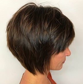 The layered, tousled top pieces and longish bangs give the tapered bob a tomboy appearance, while the side pieces fall over the ears and cradle the neck and jawline for a feminine look. When you try a hairstyle with bangs, sweep them to one side, so everyone can see your beautiful eyes. Short Textured Hair, Medium Short Haircuts, Short Shag Haircuts, Thick Wavy Hair, Short Shag Hairstyles, Bob Hairstyles For Thick, Short Hairstyles For Thick Hair, Shag Hairstyles, Best Short Haircuts