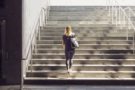 Woman walking up stairs by astrakanimages. Woman walking up stairs #Sponsored #walking, #Woman, #astrakanimages, #stairs Walking Stairs, How To Draw Stairs, Walking Up Stairs, Climbing Girl, Up Stairs, Stair Climbing, Concrete Stairs, Architecture People, Woman Walking