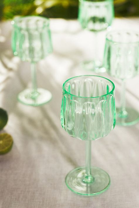 Discover the entire Outdoor Dining & Dinnerware Collection Perfect for patio and pool, these glasses are made of a durable acrylic for worry-free use indoors and outdoors. | Lucia Acrylic Wine Glasses, Set of 4 by Anthropologie in Mint, Size: S/4 wine glass Anthropologie Glasses, Colorful Wine Glasses, Acrylic Wine Glasses, Unique Wine Glasses, Colored Wine Glasses, Outdoor Entertainment, Dorm Ideas, Supper Club, Dream Kitchen