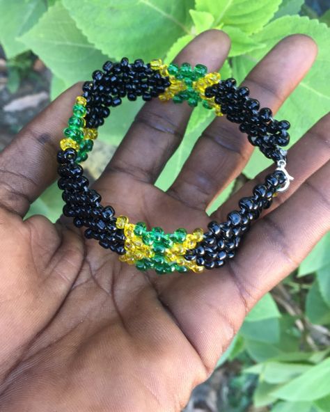 “Rep Jamaica with style! Get your unique Bracelet featuring black, gold, and green beads, symbolizing the beauty and spirit of the island. ORDERS BY: WHATSAPP Call+876-452-9986 FOR CUSTOM ORDER. Follow us on Instagram @cleantomistepentertainment_ja for more handcrafted jewelry that celebrate Jamaican culture! #Jamaican #IslandVibes #HandcraftedJewelry #SupportSmallBusiness #bracelets #braceletoftheday #artist #braceletlover #braceletshop #braceletforsale #handmadeaccessory #handmadebracel... Handmade Bra, Jamaican Culture, Whatsapp Call, Gold And Green, Green Beads, Island Vibes, Unique Bracelets, Green Bead, Handmade Accessories