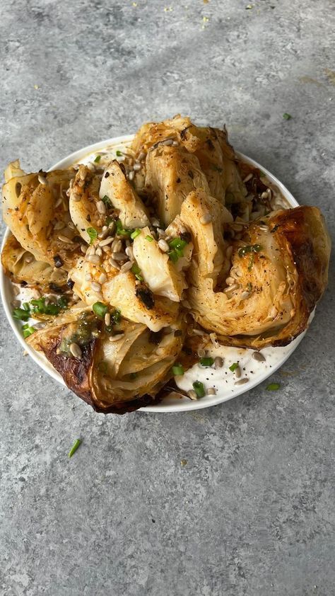 SLOW ROASTED MAPLE-CUMIN BUTTER CABBAGE WITH LEMON-PEPPER RICOTTA! Sweet, savory, caramelized in its own juices— it‘s a 10!! Throwing it back to this one from a few months ago—minimal prep time and then just let it roast! • For the cabbage: 1 small/medium cabbage head 4 tbsp unsalted butter, softened to room temperature 2 tbsp maple syrup 1/2 tsp cumin 1/2 tsp salt 1/2 tsp paprika 1 tbsp minced garlic 2 tbsp chopped scallions 2 tbsp chopped fresh oregano • For the ricotta: 3/4 cup ricotta 1 Maple Cumin Roasted Cabbage, Slow Roasted Cabbage, Slow Roasted Maple Butter Cabbage, Maple Cumin Butter Cabbage, Cabbage In The Oven, Butter Cabbage, Cabbage Cooked, Buttered Cabbage, Cabbage Head