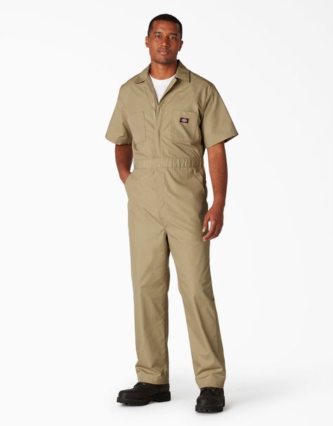 Dickies Short Sleeve Coveralls were first created over 90 years ago with the intention of protecting your ‘street’ clothes at work. Originally made of a heavy denim with button-up fronts, the Dickies Coverall has evolved with a new fabrication consisting of a Poplin/Poly/Cotton blend now in a variety of colors and zips. As one of the most trusted Dickies products featuring a generous fit in the shoulders and chest, this universally adaptable style is both functional and fashionable. The elastic- Dickies Coverall, Dickies Coveralls, Dickies Shorts, Coverall Jumpsuit, Work Uniforms, Lightweight Shorts, Street Outfit, Lifestyle Clothing, Poplin Fabric