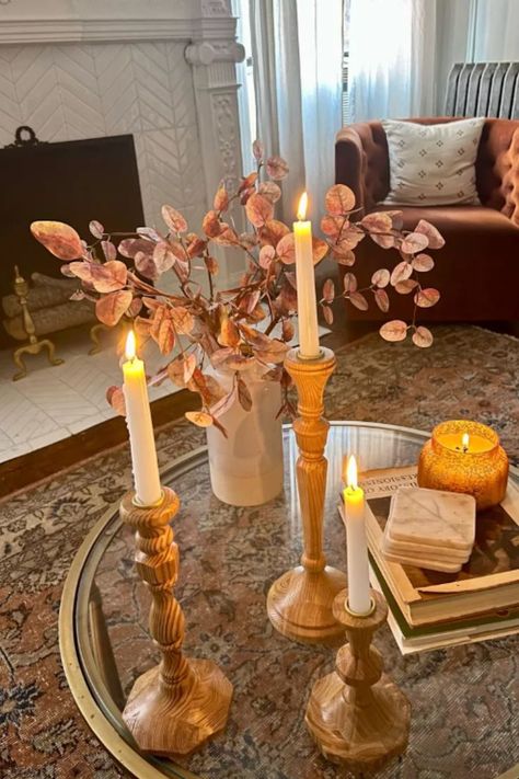 #coffeetabledecor #homedecor #coffeetable #apartmentdecor #coffeetablebook #vase #candle #candlestick Coffee Table Decor Fall, Candle Stick Decor Ideas, Glass Coffee Table Decor, Fall Branches, Coffee Table Candles, Candle Stick Decor, Round Glass Coffee Table, Candle Arrangements, Fall Candle