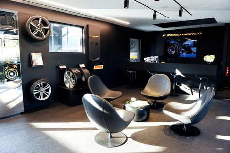 Tyre Shop Interior Design, Christmas Decor Garage, Christmas Decorations Garage Door, Garage Shoe Storage Ideas, Christmas Decorations Garage, Lamborghini Store, Garage Door Christmas Decorations, Garage Shoe Storage, Warehouse Salon