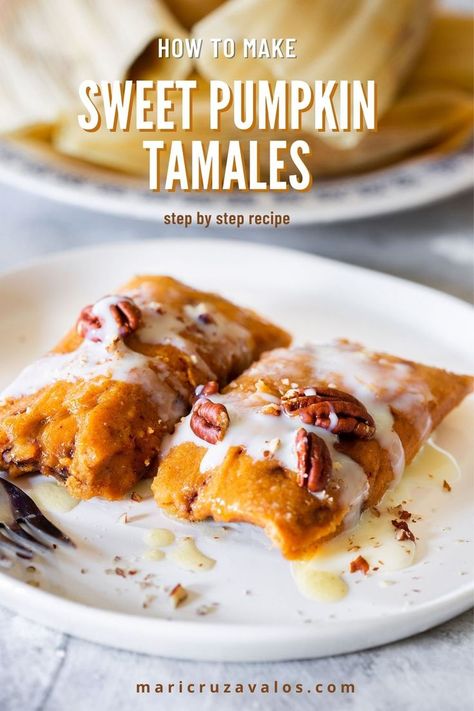 Two pumpkin tamales served with condensed milk and chopped pecans in a white plate. Text overlay. Fall Mexican Recipes, Mexican Fall Desserts, Mexican Fall Recipes, Pumpkin Tamales, Pumpkin Spice Tamales, Tamale Recipes, Mexican Pumpkin Recipes, Dessert Tamales Recipe, Sweet Tamales Recipe