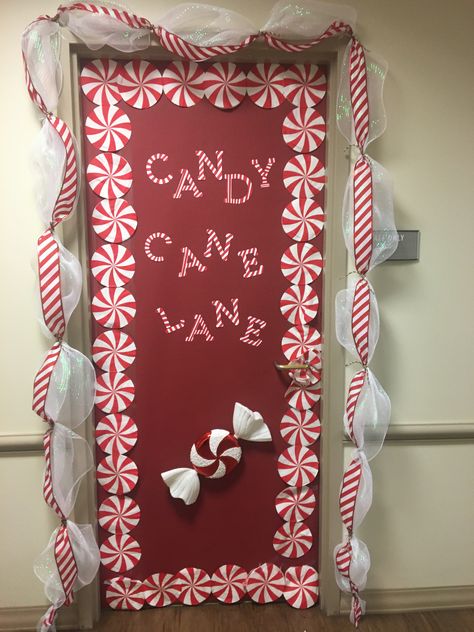 Christmas Door Decorating Contest Apartment Diy, Peppermint Classroom Door Decoration, Peppermint Classroom Door, Christmas Door Ideas For Apartments, Candy Cane Lane Bulletin Board, Decorated Classroom Doors For Christmas, Candy Cane Door Decorations Classroom, Peppermint Door Decoration, Ginger Bread Door Decorating Contest