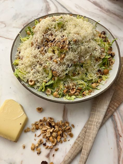 Shaved Brussels, Gruyere and Hazelnut Salad – Eden Eats Kristy Sarah, Hazelnut Salad, Shaved Brussel Sprouts, Hollywood Bowl, Low Carb Salad, Salad Dishes, Brussel Sprout Salad, Garlic Clove, Winter Salad