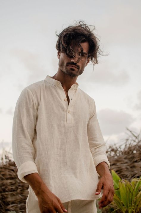 If you want to order but are not sure it will arrive in time for your trip, me and my team also deliver some items in Tulum and Playa del Carmen. If you need express shipping send me a message to check custom express shipping rates. Loose fit gauze shirt with wood buttons, inspired by life on the caribbean so comfortable for the skin and movement, ideal for those really hot days where you wish for a fabric that lets the air pass through. Care Instructions : Dry Cleaning Fausto Betancourt is a sl Banded Collar Shirts, Holiday Clothing, Gauze Shirt, Shirt Linen, Beige Outfit, Linen Shirt Men, Slow Fashion Brands, Popover Shirt, Mens Linen