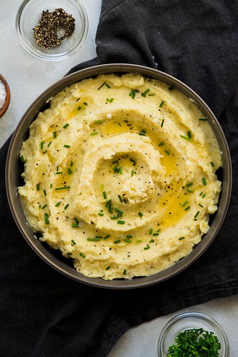 Perfect creamy mashed potatoes recipe, plus a trick to make them ahead of time! Simple mashed potatoes recipe with no heavy cream. Try this homemade recipe this Thanksgiving or Christmas! The best mashed potato recipe we have, easily customized if you want to add toppings, herbs, cheese, or more! | Life As A Strawberry | Ultimate Mashed Potatoes Recipe Ultimate Mashed Potatoes Recipe, Ultimate Mashed Potatoes, Mashed Potatoes Recipe Easy, Creamy Mashed Potatoes Recipe, Best Roast Potatoes, Parsnip Puree, Roasted Parsnips, Easy Mashed Potatoes, Homemade Mashed Potatoes