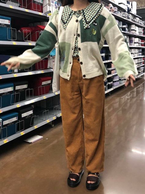 block green cardigan with brown pants and chunky sandals Studio Ghibli Cardigan, Studio Ghibli Outfits Aesthetic, Ghibli Aesthetic Outfit, Ghibli Core Outfit, Studio Ghibli Inspired Outfits, Ghiblicore Outfits, Studio Ghibli Clothes, Ghibli Inspired Outfits, Studio Ghibli Outfits