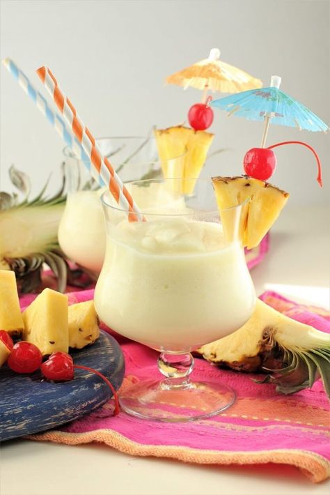 Whip up this classic Pina Colada recipe in a blender; pineapple, coconut, & rum make a creamy, slushy cocktail. Recipe to make cream of coconut included. Piña Colada Recipe, Frozen Pina Colada, Virgin Pina Colada, Cream Of Coconut, Pina Colada Recipe, Pina Coladas, Rum Recipes, Mom Party, Frozen Pineapple