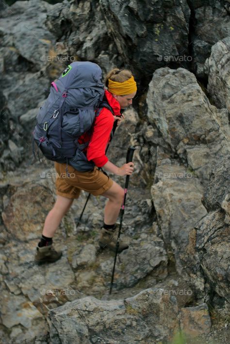 female hiker walking on a trail by PaulSchlemmer. caucasian female hiker hiking on a rocky alpine trail #AD #walking, #trail, #female, #hiker Female Hiker, Plan Wedding, Walking Trail, Seating Plan Wedding, Seating Plan, Mini Canvas, Fashion Website, Website Templates, Walk On