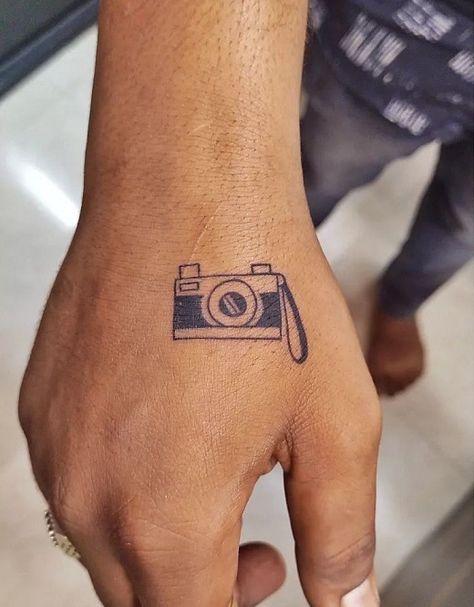 Camera Tattoo Digital Camera Tattoo, Tattoo Ideas Camera, Simple Camera Tattoo, Polaroid Camera Tattoo, Camera Tattoo Ideas, Media Tattoo, Vintage Camera Tattoos, Polaroid Tattoo, Tattoo Artist Quotes