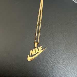 Jewelry | 2 Nike Swoosh Necklace And Pendant Gold Silver | Poshmark Nike Chain, Nike Necklace, Anime Backgrounds, Xmas List, Cool Anime Backgrounds, Nike Swoosh, Pendant Gold, Gift For Birthday, Steel Necklace