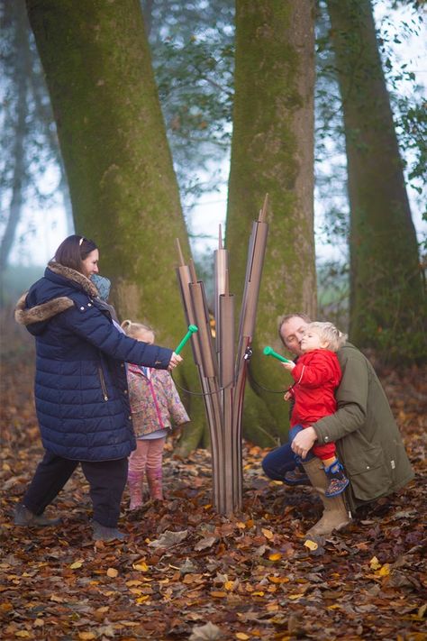 Our new Cattail Chimes are instantly recognizable as the slender marsh plant with tall stems and dark brown velvety heads. Stainless-steel ‘stems’ support the three or six light bronze cylindrical anodized aluminum chimes, which produce tranquil and harmonic sounds when struck with small soft green mallets. Perfect for playful interactions along nature trails, in parks, or in woodlands, citizens can stop and enjoy a moment of musical mindfulness while exploring the great outdoors. Outdoor Musical Instruments, Sensory Gardens, Ground Design, Outdoor Gathering Space, Outdoor Music, Sensory Garden, Park Trails, Music For You, Common Ground