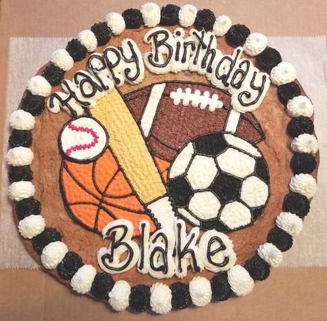 Sports cookie cake Sports Cookie Cake, Cookie Cake Birthday Designs Boy, Sports Theme Birthday Cake, Basketball Cookie Cake, Sports Cake Ideas, Baseball Cookie Cake, Cookie Cake Decorating Ideas Birthdays, Football Cookie Cake, Sports Birthday Cake