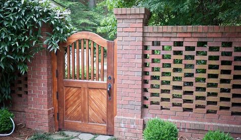 Few shots of a custom gate and pierced brick wall we designed.  Turned out nice! Brick Wall Gardens, Picket Fence Garden, Wooden Garden Gate, Wooden Gate, Fence Planters, Brick Fence, Custom Gates, A Brick Wall, Front Yard Fence