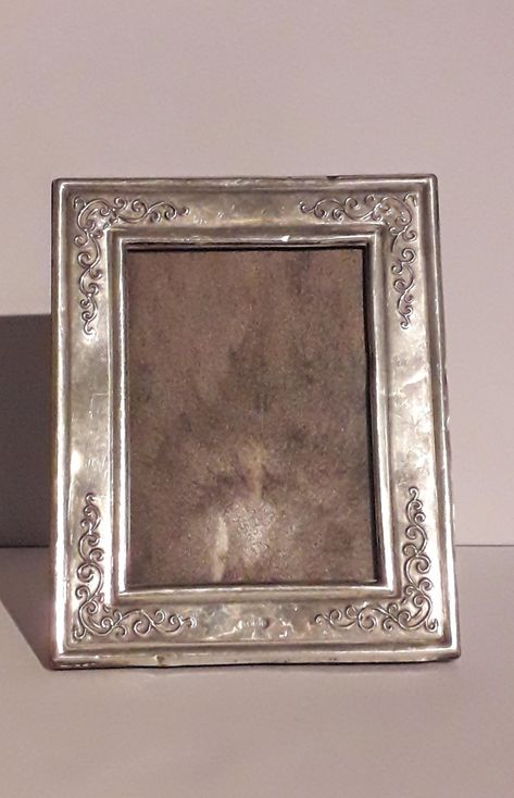 A pretty English silver mounted photo frame. Hallmarked for Sheffield silver, date letter S for 1992 and the makers mark. Plastic backing. Overall considered to be in good condition however, there is a little gap from the silver mounting in places as shown in the photo.  There are some very tiny pinprick dents to the silver, not many but mentioned for accuracy and a little crease. Measuring 12.75cm high x 10.25cm wide Aperture 8.75cm high x 6.25cm wide. Sent via a secure traceable service. Silver Picture Frame, Silver Picture Frames, Wedding Picture Frames, Silver Frames, Wedding Picture, Wedding Frames, Antique Toys, Old Antiques, Letter S