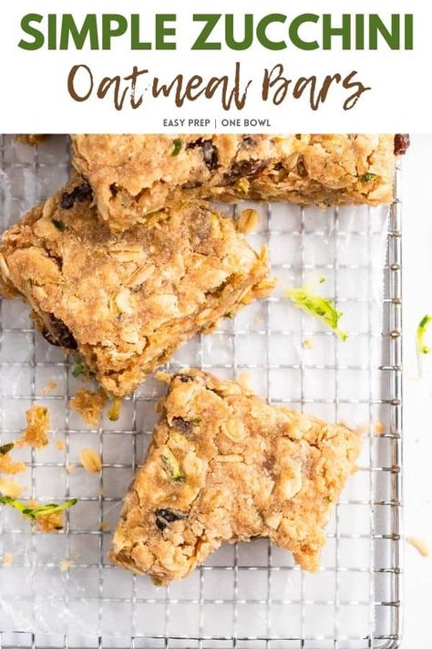 These Zucchini Bars are full of oats, fresh zucchini, juicy raisins and a perfect hint of cinnamon. The best of zucchini bread in a bar. The easiest to put together--a nice crumbly summer treat! #zucchinibread #oatmealbars #zucchini #oats #crumblebars Zucchini Banana Oatmeal Bars, Zucchini Oatmeal Bars, Zucchini Oats, Zucchini Bars, Bar Treats, Zucchini Oatmeal, Zucchini Cookies, Oatmeal Bites, Berry Oatmeal