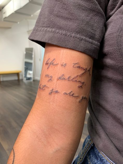 Quote On Arm Tattoo Women, Smaller Arm Tattoos For Women, Where To Put Writing Tattoos, Western Quote Tattoos For Women, Tattoos About Husband, Inspiring Quotes For Tattoos, Special Ed Tattoo Ideas, Loved Ones Writing Tattoo, Life Is Tough Tattoo