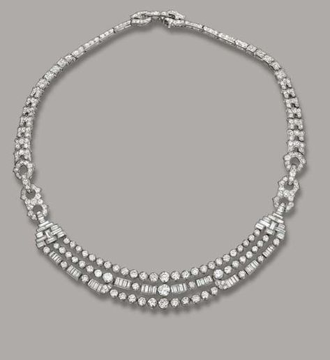 A FINE ART DECO DIAMOND NECKLACE, BY CARTIER   Designed as three brilliant and baguette-cut diamond line swags to the stepped connecting links with pavé-set buckle and graduated geometric backchain, circa 1925, 40.5 cm. long, in original red leather Cartier case  Signed JC for Jacques Cartier, Nos. 5009, 8015, 4382 Duchess Of Devonshire, Royal Jewellery, Real Diamond Necklace, Sparkly Necklace, Royal Crowns, Bridal Diamond Jewellery, British Monarchy, Diamond Necklaces, Cartier Jewelry