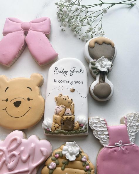 Baby girl is coming soon…. Winnie the Pooh baby shower sugar cookies 🌸💗���🍯 how sweet are these? #babyshower #babyshowersugarcookies #winniethepooh #winniethepoohcookies #cookieart #cookieartist #cookies #cookier #cookiesofinstagram Pooh Baby Shower Cookies, Winnie The Pooh Baby Shower Girl, Girl Baby Shower Winnie The Pooh, Vintage Winnie The Pooh Cookies Decorated, Classic Winnie The Pooh Cookies Decorated, Winnie The Pooh Cookies Baby Girl, Baby Cookies, Baby Coming, Cookie Inspiration