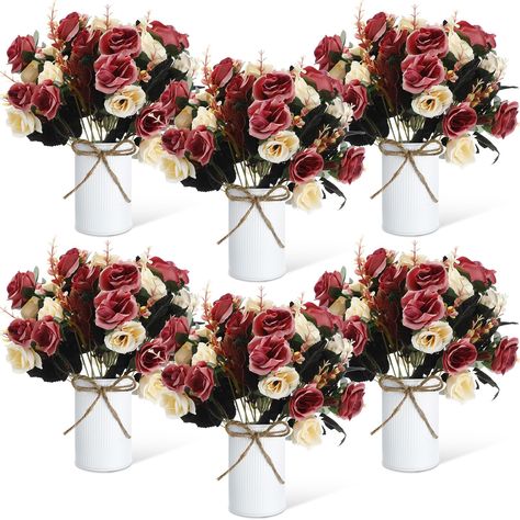 PRICES MAY VARY. Generous Package Contents: this set includes 6 metal flower pots and 12 artificial flower bouquets, offering ample versatility for different types of decorative projects; Whether you want to make a single, stunning centerpiece or multiple smaller displays, this package has got you covered Reliable and Long Lasting: the artificial silk roses are designed and constructed from quality materials such as plastic, wire, and silk; Each component of the artificial roses has been careful Mum Wedding Centerpieces, Rustic Fall Wedding Centerpieces, Roses Centerpieces, Rose Gold Centerpiece, Communion Table, Table Centerpieces Diy, Metal Flower Pots, Rose Centerpieces, Fall Wedding Centerpieces