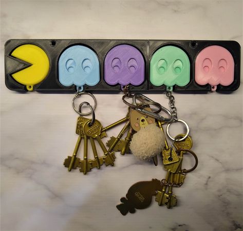 STL file Pac Man Key Holder 👨 ・3D printable design to download・Cults Pac Man, 3d Printable, Printable Designs, Key Holder, Key Rings, 3d Printing, Key, Design