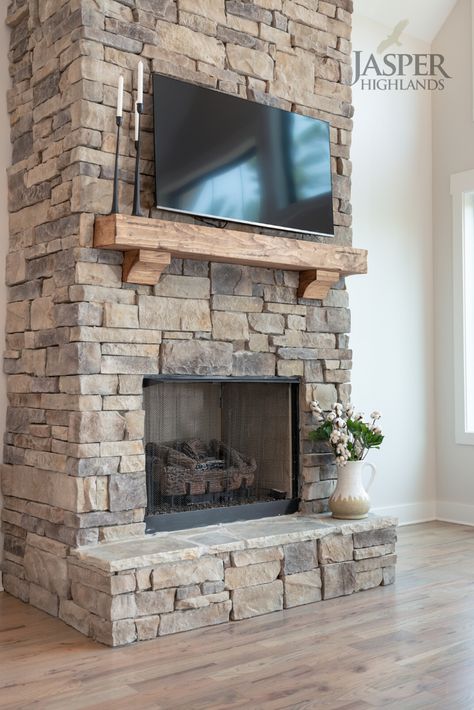 Stone Fireplace With Light Wood Floors, Wood Burning Fireplace Stone Surround, Gas Stone Fireplaces, Freestanding Stone Fireplace, Indoor Rock Fireplace, Different Types Of Stone Fireplaces, Jasper Highlands Tn, Ashfall Country Ledgestone Fireplace, Stone Wood Fireplace