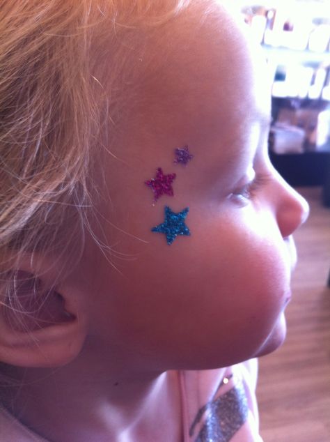 glitter tattoo Glitter Uggs, 4th Of July Makeup, Tattoo Prices, Pamper Party, Glitter Tattoo, Crown Tattoo, Kids Makeup, Makeup Tattoos, Body Glitter