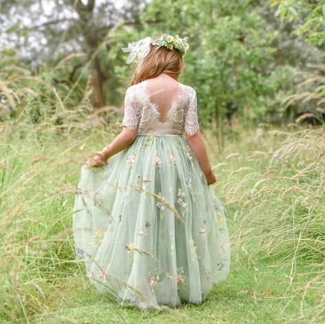 'Enchanted Dress - Fern Green /White Lace' These are so stunning, a truly beautiful girl's occasion dress. Our enchanting lace and tulle with our newest patterned lace is a perfect flower girl dress. It is made with a delicate floral patterned off-white coloured lace bodice, with a matching embroidered fern /sage green tulle skirt. The V-shaped back with unfinished lace adds the perfect vintage charm to this dress. The lace bodice is baby-soft and has a slight stretch. While our dresses are wide Flower Girl Dress For Kids, Olive Green Flower Girl Dress, Green Floral Bridesmaid Dresses, Floral Flower Girl Dresses, Orange Dress Accessories, Sage Green Flower Girl Dress, Sage Flower Girl Dress, Embroidered Fern, Green Tulle Skirt