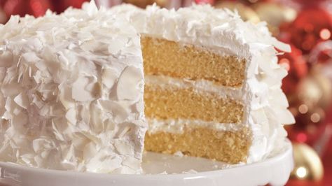 Orange Is The New Black Coconut Cake Recipe Pina Colada Cake Recipe, Perfect Christmas Dessert, Pina Colada Cake, White Chocolate Frosting, Coconut Cake Recipe, White Cake Mixes, Coconut Cake, Piece Of Cake, Round Cake Pans