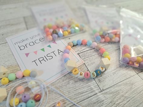 Your girl will love to design her very own personalized stretch bracelet with this easy bracelet making kit. Each kit comes with everything you need to make one stretch bracelet including the letter beads for your name. This craft is an easy and fun way for girls to be creative. If you are looking for a unique activity for just one girl or a group of kids, these craft kits are perfect! Keep girls busy at a sleepover or birthday party and the best part... no paint = no messy clean up!  Each kit includes: - Stretch cord - Beads needed to make the bracelet with letter beads for your name. You will likely have a few beads left over. - Packaged in individual bags - perfect for party favors too! Bracelet Making Station Birthday Prty, Cheap Trendy Beaded Bracelets For Party Favors, Cheap Round Beads Bracelets For Party Favors, Cheap Personalized Bracelets For Party Favors, Cheap Bracelets For Party Favors, Cheap Bracelet Jewelry For Party Favors, Cheap Multicolor Beaded Bracelets For Party Favors, Playful Cheap Bracelets For Party Favors, Clay Activities For Kids Bracelet