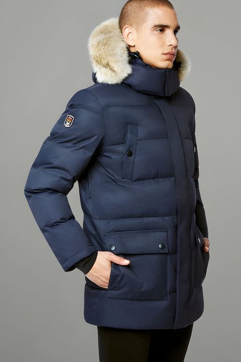 The Colburn is a luxurious arctic-weight 3/4-length men's down jacket with a baffled construction. See more alternatives to Canada Goose on Marmalade and shop beyond the mainstream. #WinterWear #CanadaGooseAlternatives #SustainableStyle #OuterwearInnovation #ColdWeatherGear #WinterOutfit #WinterCLothes #WinterJackets #ColdWeatherAccessories Canada Goose Parka, Mens Down Jacket, Circular Fashion, Mens Fur, Cold Weather Gear, Fur Hood, Cold Weather Accessories, Marmalade, Winter Wear