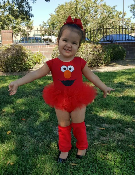 Elmo handmade tutu leotard and legwarmers Sesame Street Tutu Outfits, Elmo Tutu Birthday Outfit, Elmo Toddler Costume, Elmo Cricut Projects, Pink Elmo Birthday Party, Elmo And Abby Cadabby Birthday Party, Elmo First Birthday Party Girl, Sesame Street Birthday Outfit, Elmo Birthday Party Girl