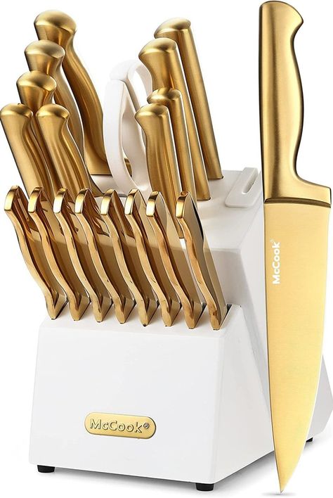 \n\tMcCook MC69G Luxury Golden Titanium Kitchen Knife Set with Sharpener\n\n\n\t\n\nMcCook MC69G 20-piece knife set features titanium coated rust-resistant golden knives and white wash finish wood block with built-in sharpener.\n Package Contents:\n 1PC-8\" Chef Knife + 1PC-8\" Slicing Knife\n 1PC-8\" Bread knife + 1PC-7\" Santoku Knife\n 1PC-4.5\" Pizza knife + 1PC-5\" Utility Knife\n 1PC-3.5\" Paring Knife\n 8PCS Serrated 4.5\" Seak Knife\n 2 P Pizza Knife, Kitchen Essentials List, Gold Kitchen Accessories, White Wash Finish, Charming Kitchen, Kitchen Gadgets Unique, Kitchen Organisation, Gadgets Kitchen Cooking, Kitchen Table Decor